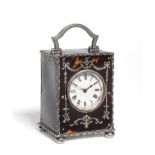 A Small Tortoiseshell and Silver Mounted Carriage Timepiece, 1908, silver carrying handle, leaf