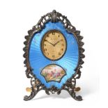A White Metal and Blue Enamel Strut Timepiece, retailed Wegelin, Geneve, circa 1910, scroll and