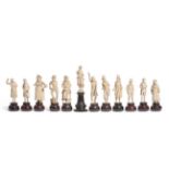 A Set of Eleven Dieppe Ivory Dickensian Figures, late 19th century, each standing figure on turned