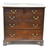 A George III Oak Straight Front Chest of Drawers, late 18th century, of two short over three long