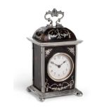 A Tortoiseshell and Silver Mounted Carriage Timepiece, circa 1910, caddied top with a scroll