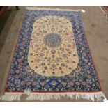 Finely Woven Isfahan Rug Central Iran The ivory field cnetred by a mint green flowerhead medallion