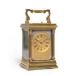 A Brass Striking and Repeating Carriage Clock, circa 1900, carrying handle, repeat button, fluted