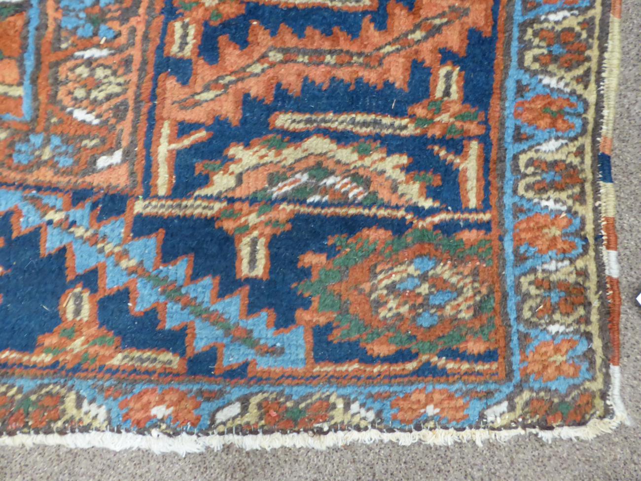Heriz Carpet Persian Azerbaijan, circa 1910 The terracotta field of angular vines around an indigo - Image 3 of 6