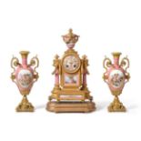 An Ormolu and Porcelain Mounted Striking Mantel Clock with Garniture, circa 1880, urn finial, side