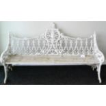 A Victorian Cast Iron Bench of Gothic Pattern, probably Coalbrookdale, with wood slatted seat,