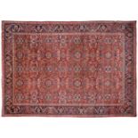 Mahal Carpet of large size West Iran The madder field with an allover design of large flowerheads