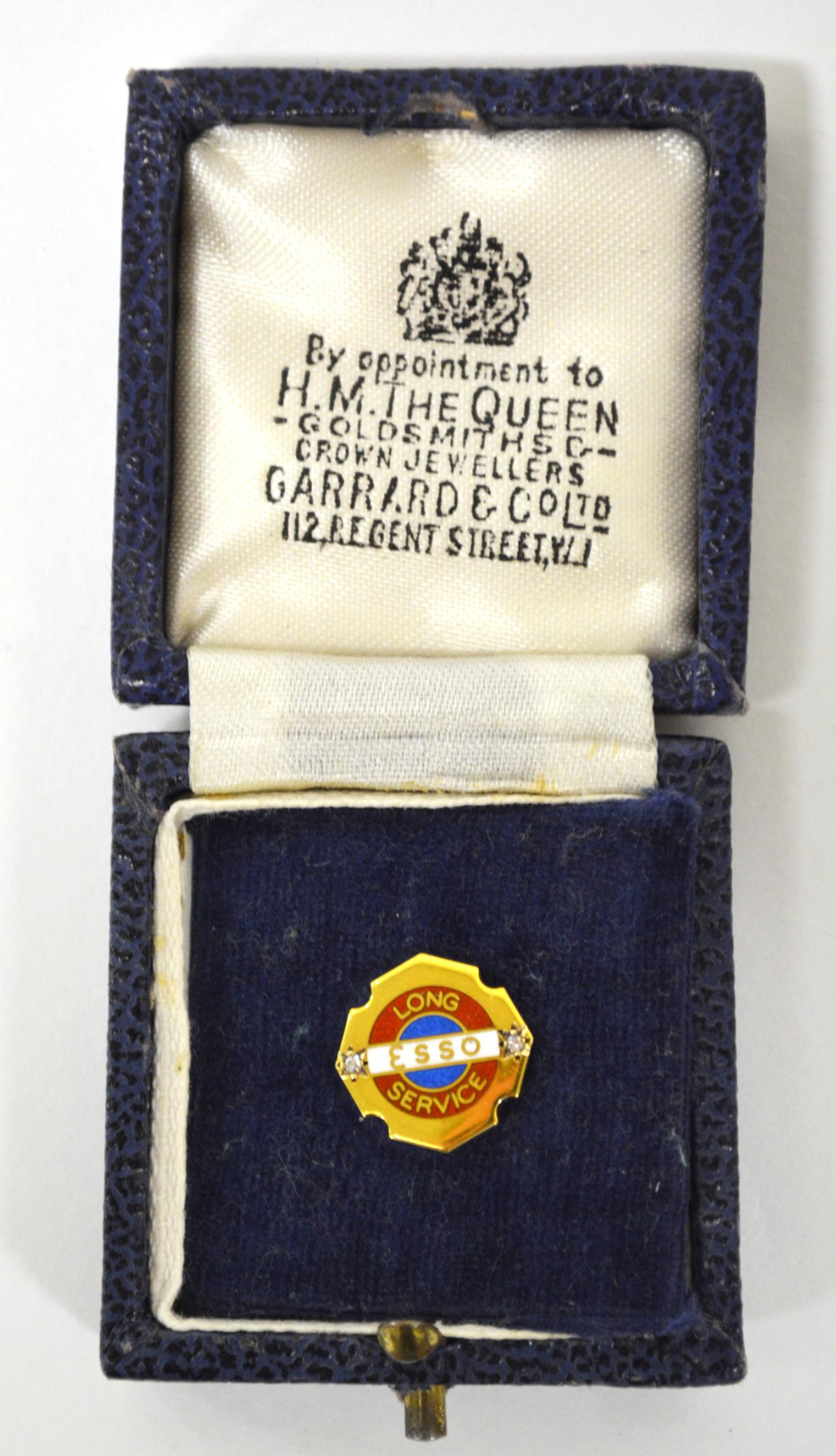 A 9ct Gold and Enamel Lapel Pin, stamped Esso Long Service, with two small diamond chips, the - Image 2 of 2