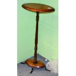 A candle/knife box and an oval shaped occasional table/stand
