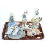 Five various Lladro figures, girls with geese, pig and piglets etc (5) All appear in good condition.