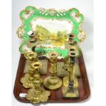 Brass candlesticks and an early 19th century porcelain dish, part gilt and painted with a scene
