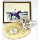 A horse and jockey car mascot mounted on an alabaster ashtray, circa 1920, together with a signed