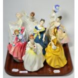 Eight Doulton figures 'Adele' HN2480, 'Lisa' HN2394, 'Adrienne' HN2304, 'Pamela' HN2479, 'Flower