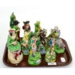 A group of early 19th century Staffordshire pearlware bocage figures (9)