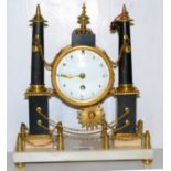 A French portico clock bearing signature Maniere, and key