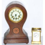 An Edwardian inlaid mahogany balloon mantel clock together with a brass carriage timepiece, dial