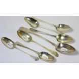 Six Georgian silver table spoons and a basting spoon (7) 16.5ozt