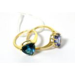 A 9ct gold tanzanite ring and a 9ct gold topaz ring