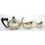 A silver three piece tea service 12.3ozt