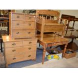 A pine farmhouse kitchen table and two pine chests of drawers
