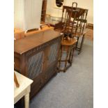 An oak corner occasional table possibly Titchmarsh & Goodwin, oak cabinet, folding cake stand and