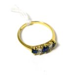 An early 20th century sapphire and diamond ring, total estimated diamond weight 0.25 carat