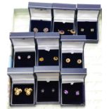 Nine pairs of gem set stud earrings, including amethyst, sapphire and citrine (9)