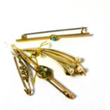 A 9ct gold cultured pearl brooch, a seed pearl brooch by Murrle Bennett & Co, a peridot and pearl