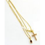 A 9ct gold ruby pendant on chain and a ruby cross pendant