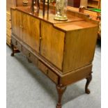 A 1920's/30's sideboard, label marked Druce & Co Ltd Baker St, London