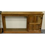 A Wilf ''Squirrelman'' Hutchinson oak surround with end cupboard and carved squirrel signature