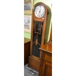 A 1920's/1930's oak longcase clock