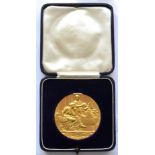 The Society of Dyers and Colourists, a 22ct gold medal, obverse with a relief figurative scene,