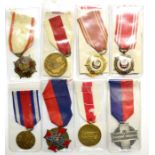 A Collection of Eleven Polish Medals, comprising:- three Medals of Merit for National Defence, 1966,