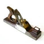 A 13 1/2inch Steel Panel Plane, possibly by Edward Preston, with walnut infill and handle, brass