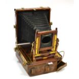 Triple Victo Plate Camera mahogany body with brass fittings for 6x4'' plates, with two Thornton-