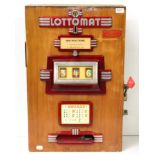 Lottomat Wall Mounted One Arm Bandit with cast decorations to front and three number spinners