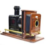 Magic Lantern in mahogany with bellows moved on telescopic rail, with non-original plaque '