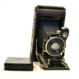 Ensign Convertible Folding Camera for roll film or plates, with Ross f4.5, 5 1/2'' lens and Deckel-