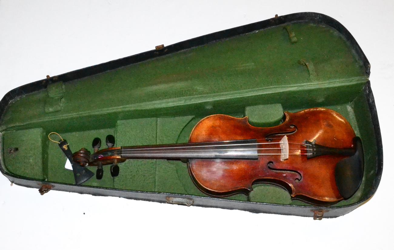 A 19th Century German Violin, no label, with a 360mm one piece back, ebony tuning pegs, in a leather