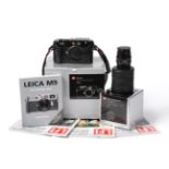Leica M9 Digital Camera Body no.38336637, black body in 'crocodile' leather case, in original box
