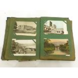 A Distressed Postcard Album housing a range of vintage topographical, comic, real photographic