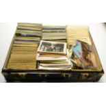 A Small Case housing a range of unused and used foreign cards, vintage to modern. Includes a