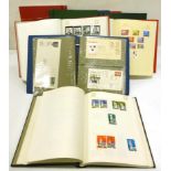 Great Britain in four Tower albums housing a mint and used QEII collection to 2000. Plus a few