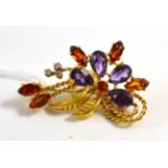 An 18ct gold amethyst, citrine and diamond spray brooch