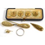 A cased set of four dress studs together with three pieces of gilt metal mounted lava jewellery