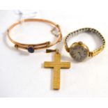 A blue stone set twist bangle, a cross pendant and a wristwatch (3)