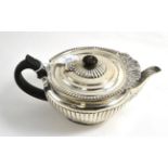 An Edwardian silver teapot, London, 1906, by Goldsmith, Silversmiths Co