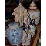 A Chinese blue and white jar and cover, a Chinese covered vase Staffordshire flat-back figure