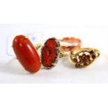 Two coral rings, a 9ct rose gold band ring and a 9ct gold garnet cluster ring (4)